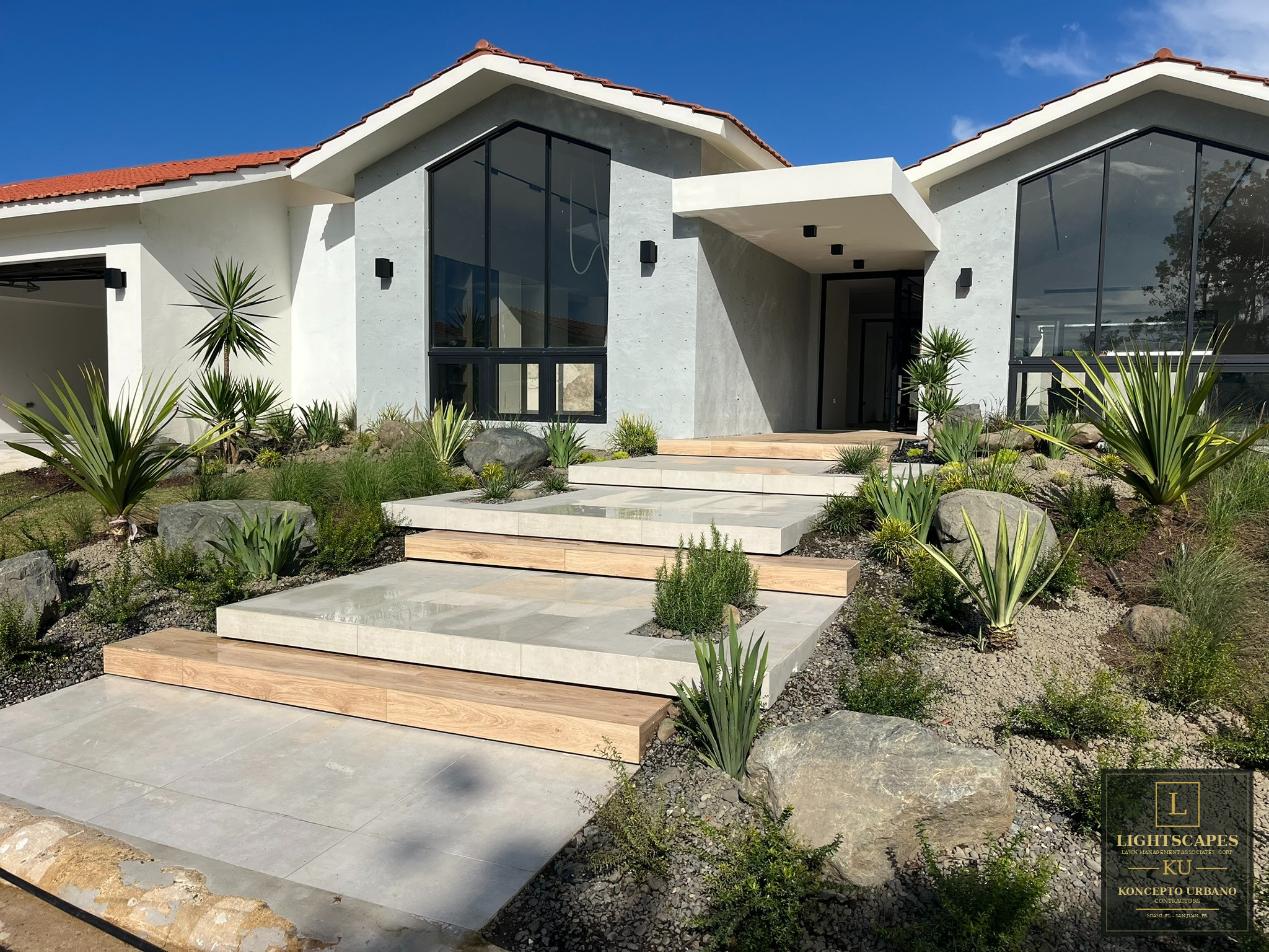 Completed residential landscape after professional renovation and lighting installation